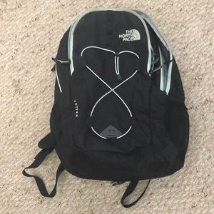 Black and baby blue the north face backpack